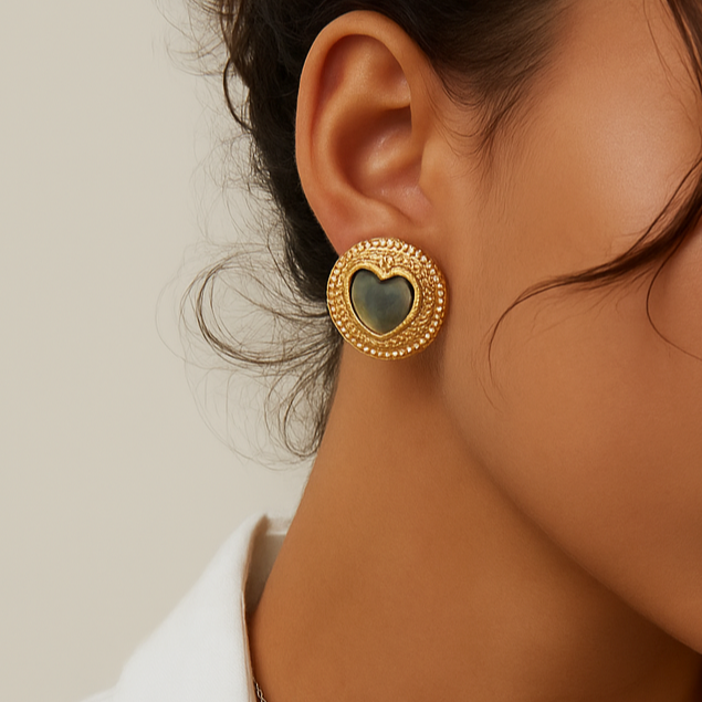 Solara iridescent shell, gold-plated, 925 sterling silver earring on neutral background