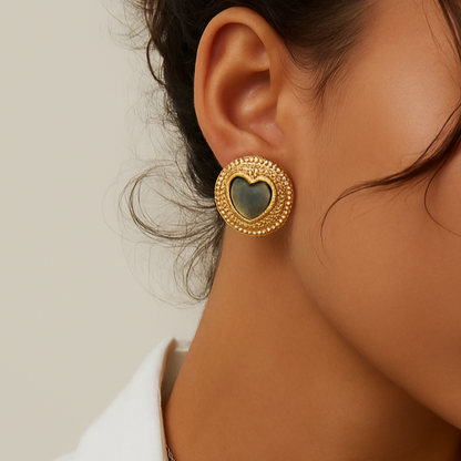 Solara iridescent shell, gold-plated, 925 sterling silver earring on neutral background