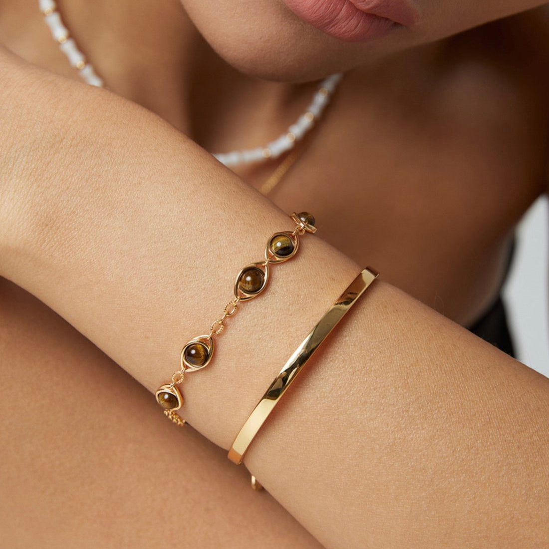 Solara tiger’s eye, 925 sterling silver bracelet on neutral background