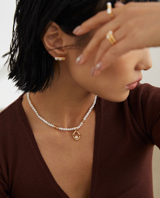 Solara natural pearl, 925 sterling silver necklace on neutral background