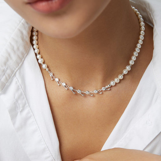 Solara natural pearl, zircon, 925 sterling silver necklace on neutral background