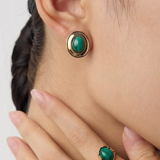Solara natural malachite, S925 sterling silver gold-plated stud earrings on white background

