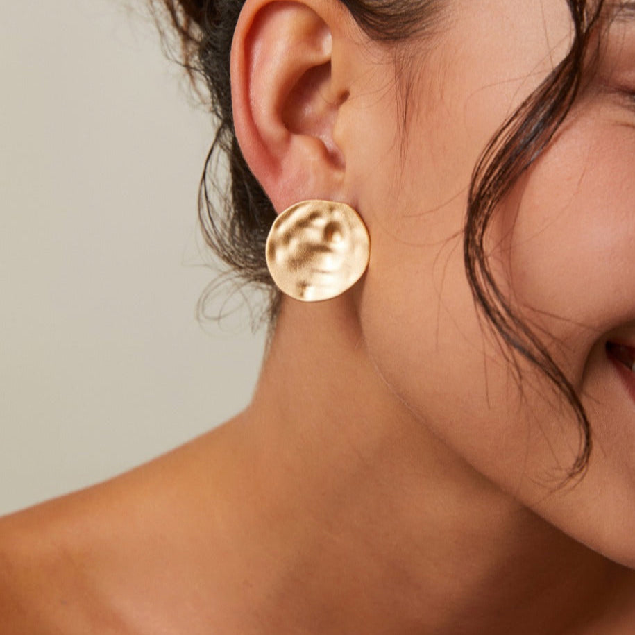 Solara 925 sterling silver earring on neutral background